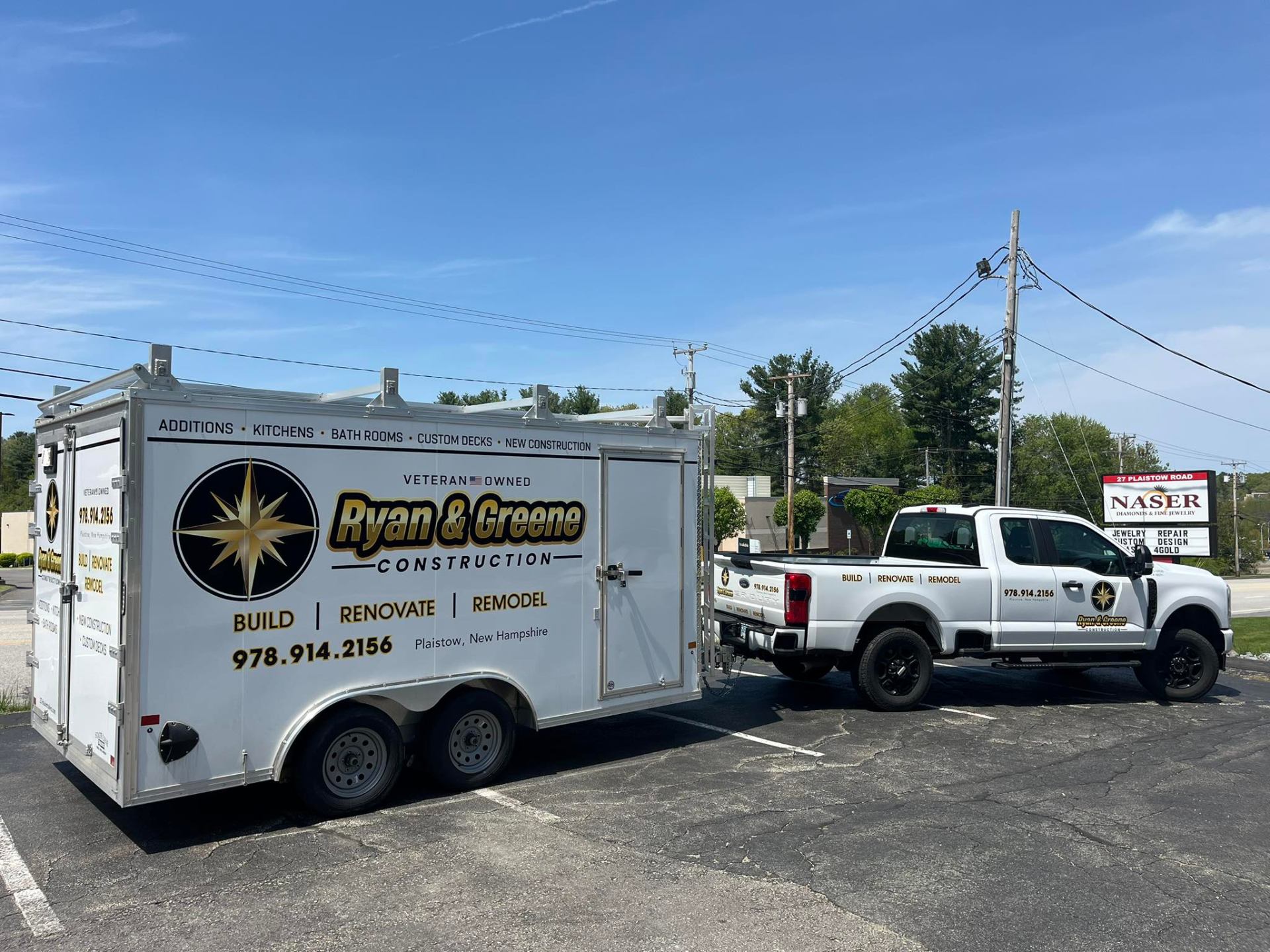 Ryan & Greene Construction professional work truck and trailer